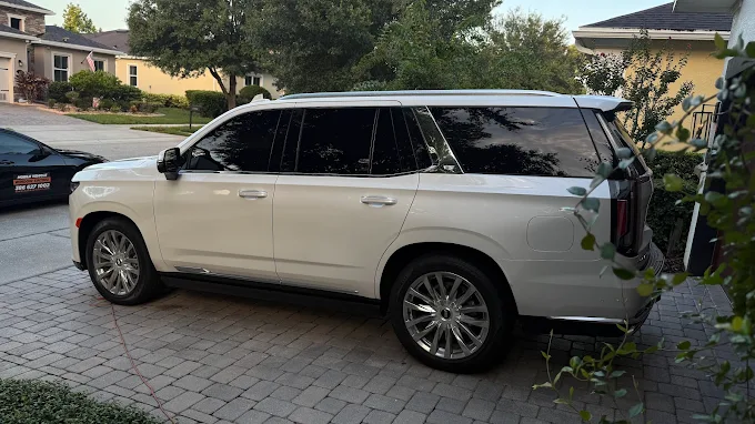 White Cadillac Escalade — mobile install at customer driveway